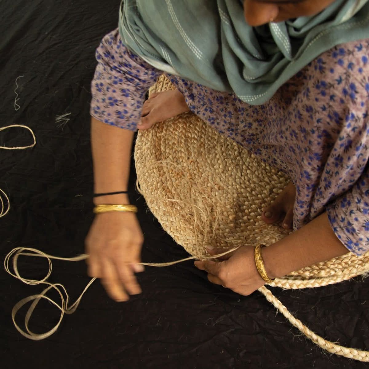bangladeshi women working with jute rope